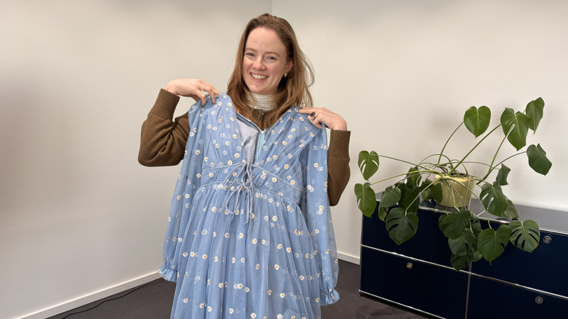 Carolyn Eden’s favourite thing to make is dresses. Here she is with one of her favourite designs.