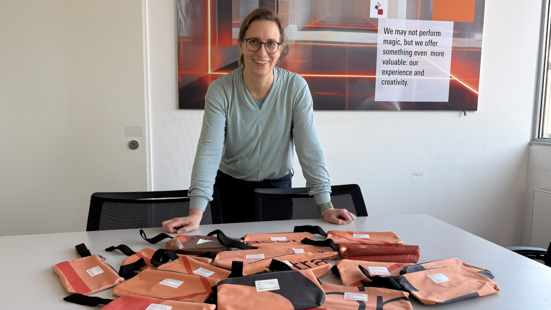 Ulla Kreuzer with a selection of recycled banner bags.