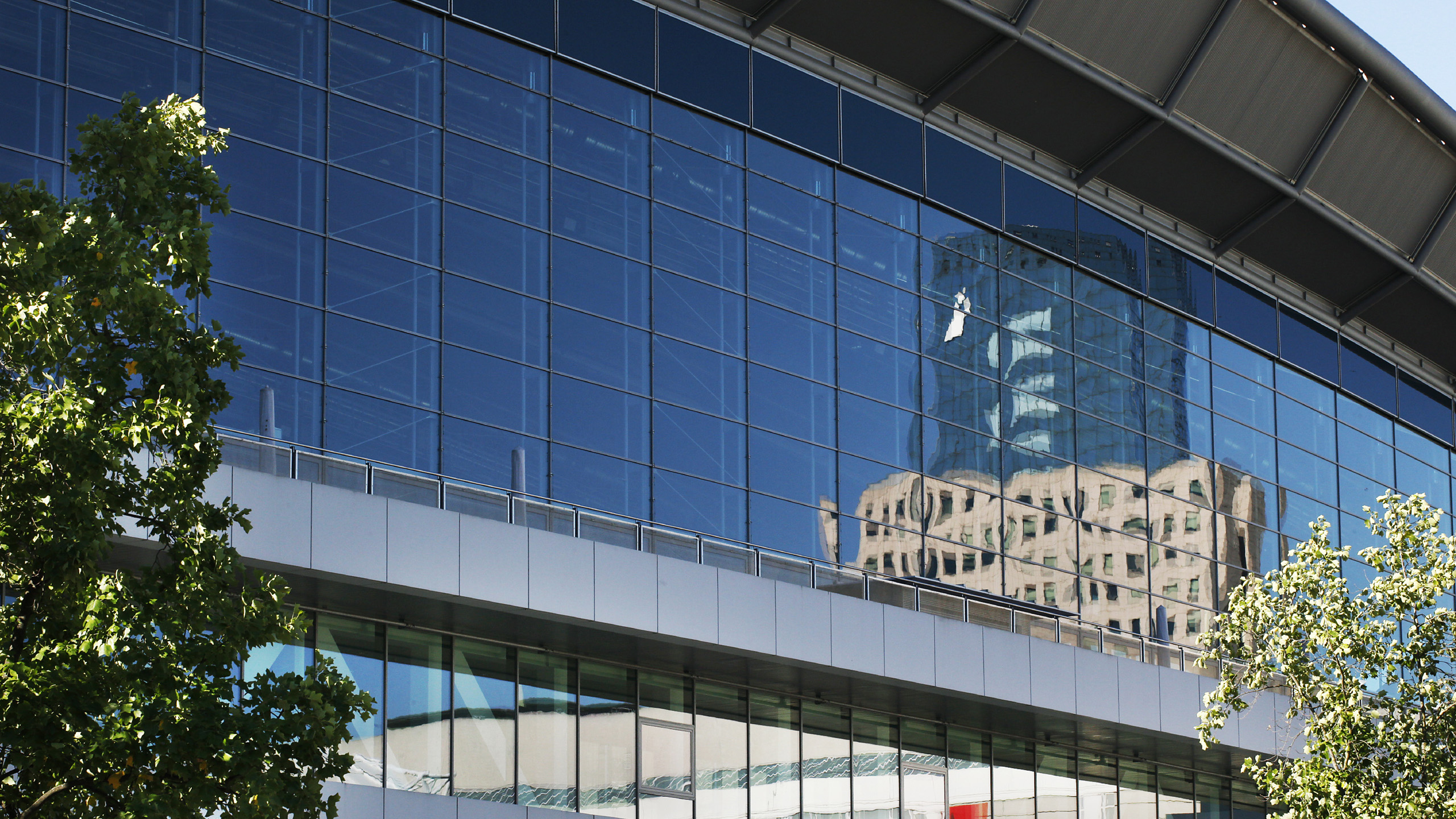 Messe Frankfurt fairground view with a reflection of the Torhaus office building