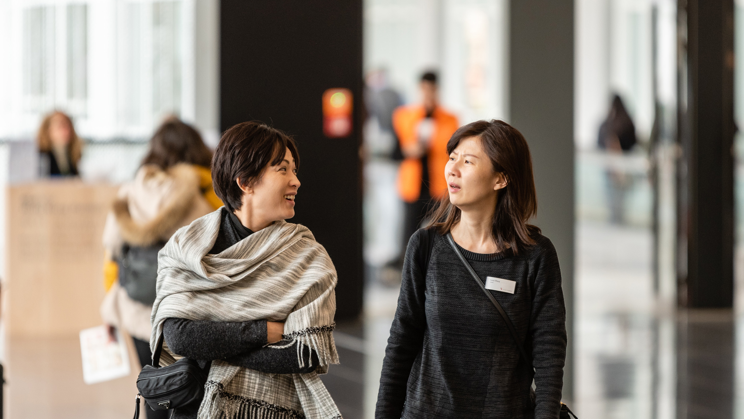 Asian visitors at a trade fair